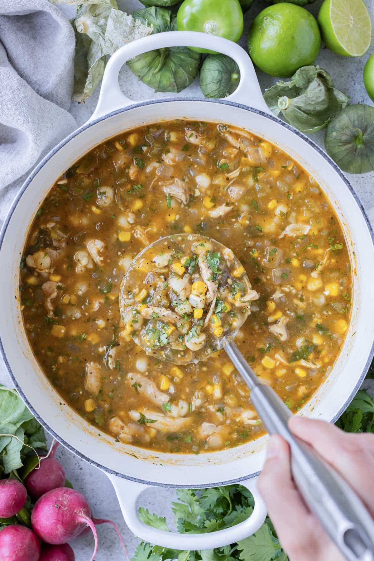 A ladle is used to serve up some Mexican chicken soup.