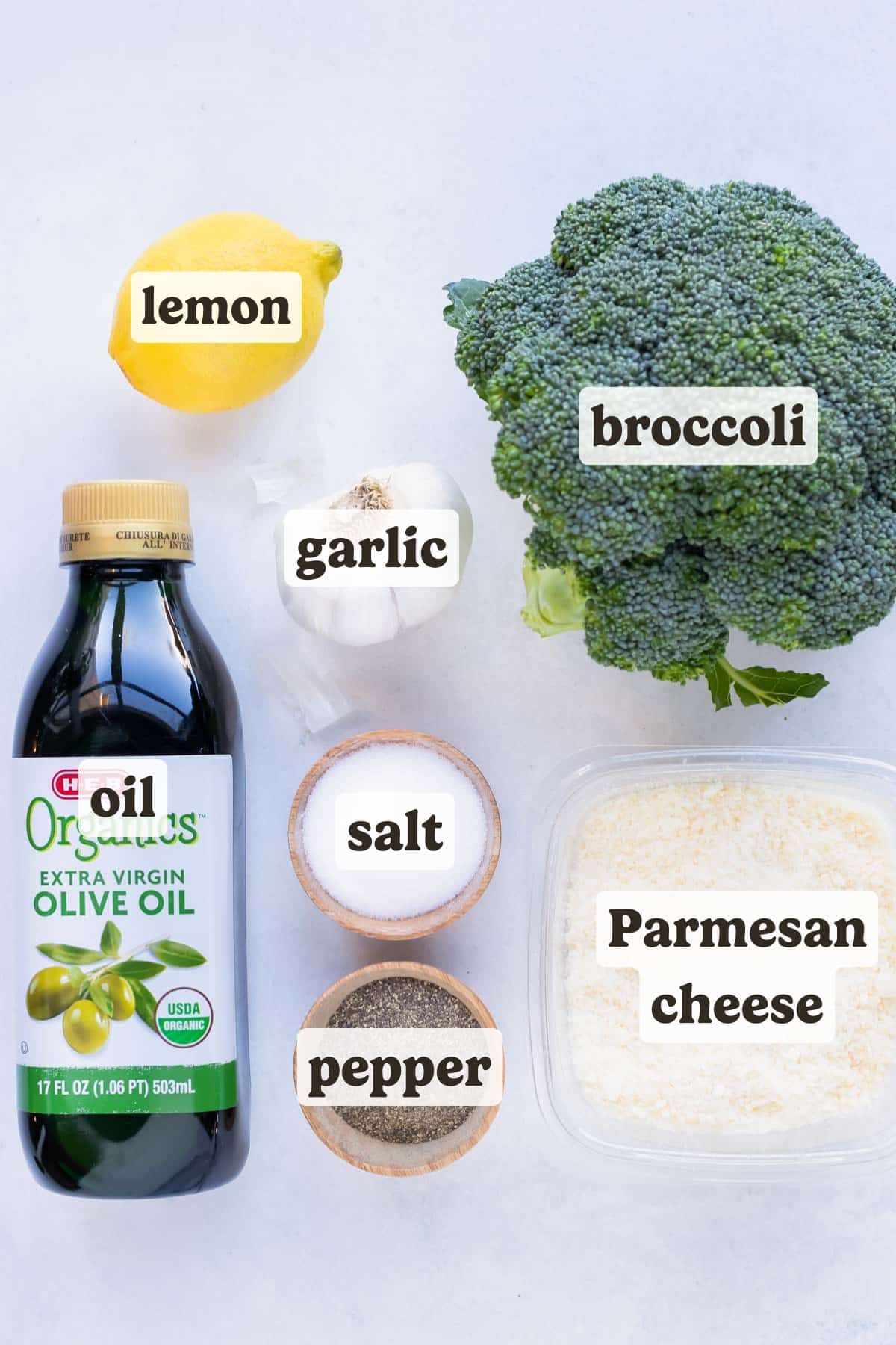 Broccoli, olive oil, lemon, garlic, parmesan, salt, and pepper are the ingredients for this air fryer broccoli recipe.