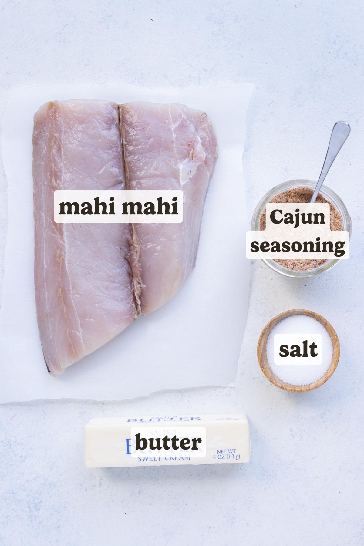 Mahi mahi, Cajun seasoning, butter, and salt are the ingredients for this Blackened Mahi Mahi recipe.