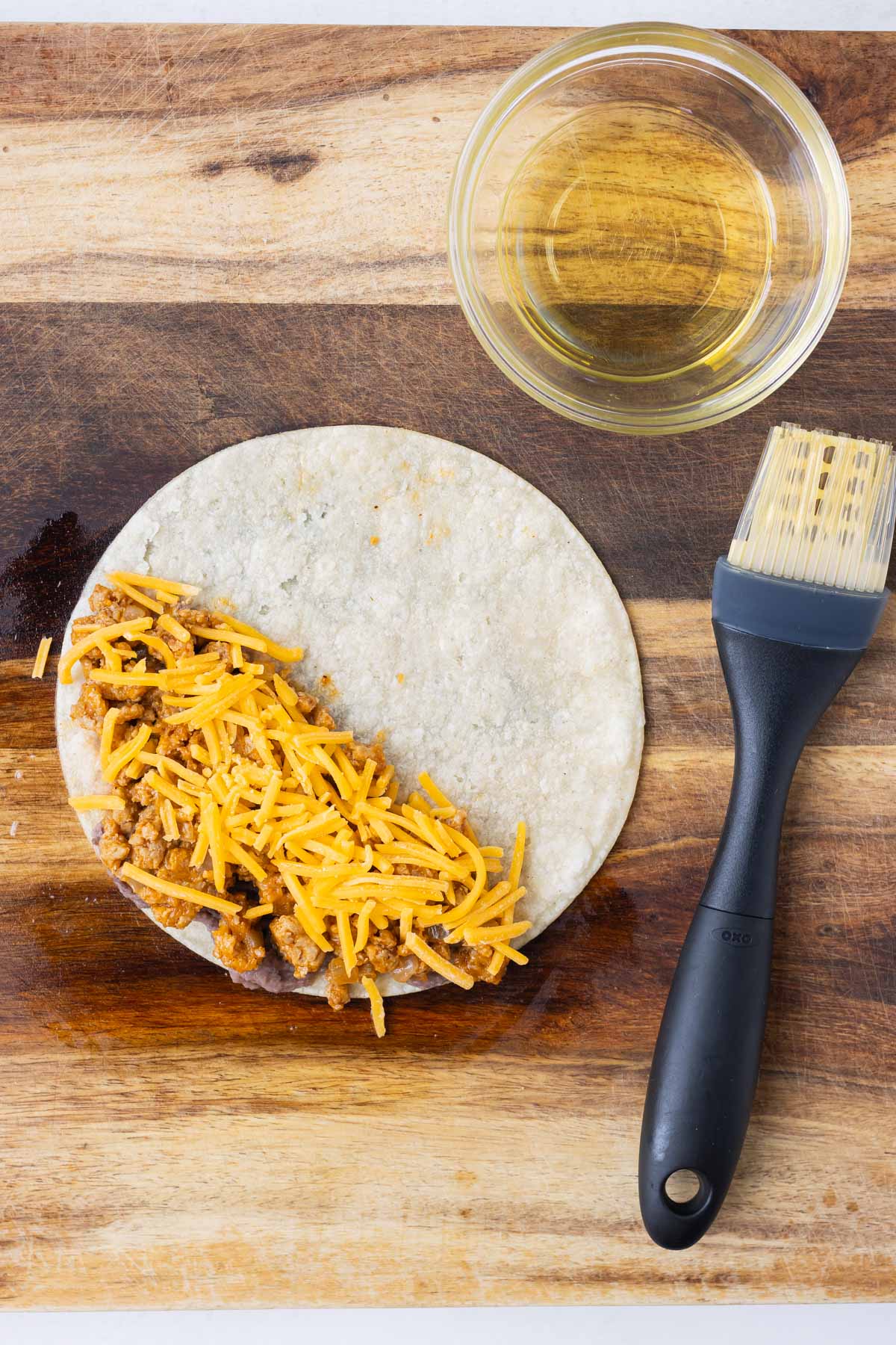 Half of a tortilla is filled.