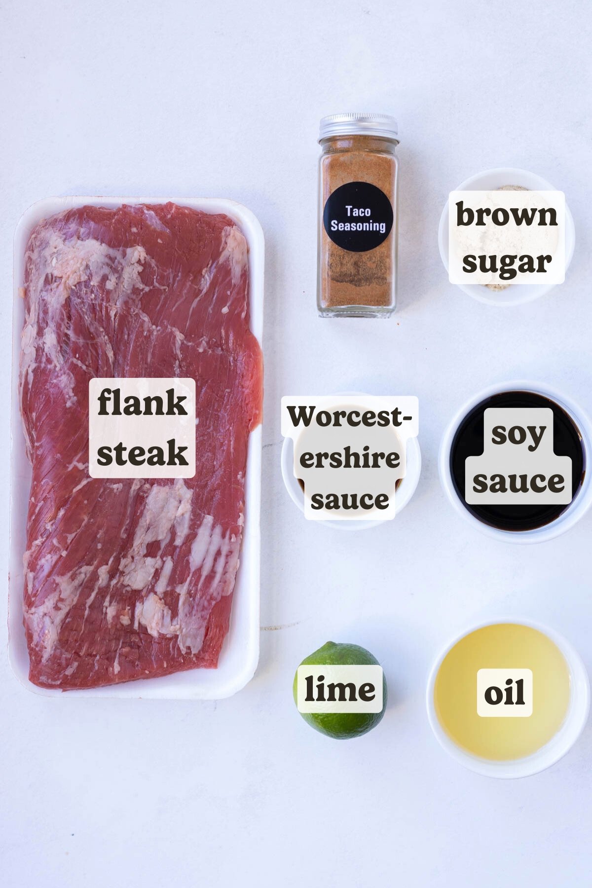 Flank steak, taco seasoning, brown sugar, lime, and soy sauce are the main ingredients for this flank steak salad.