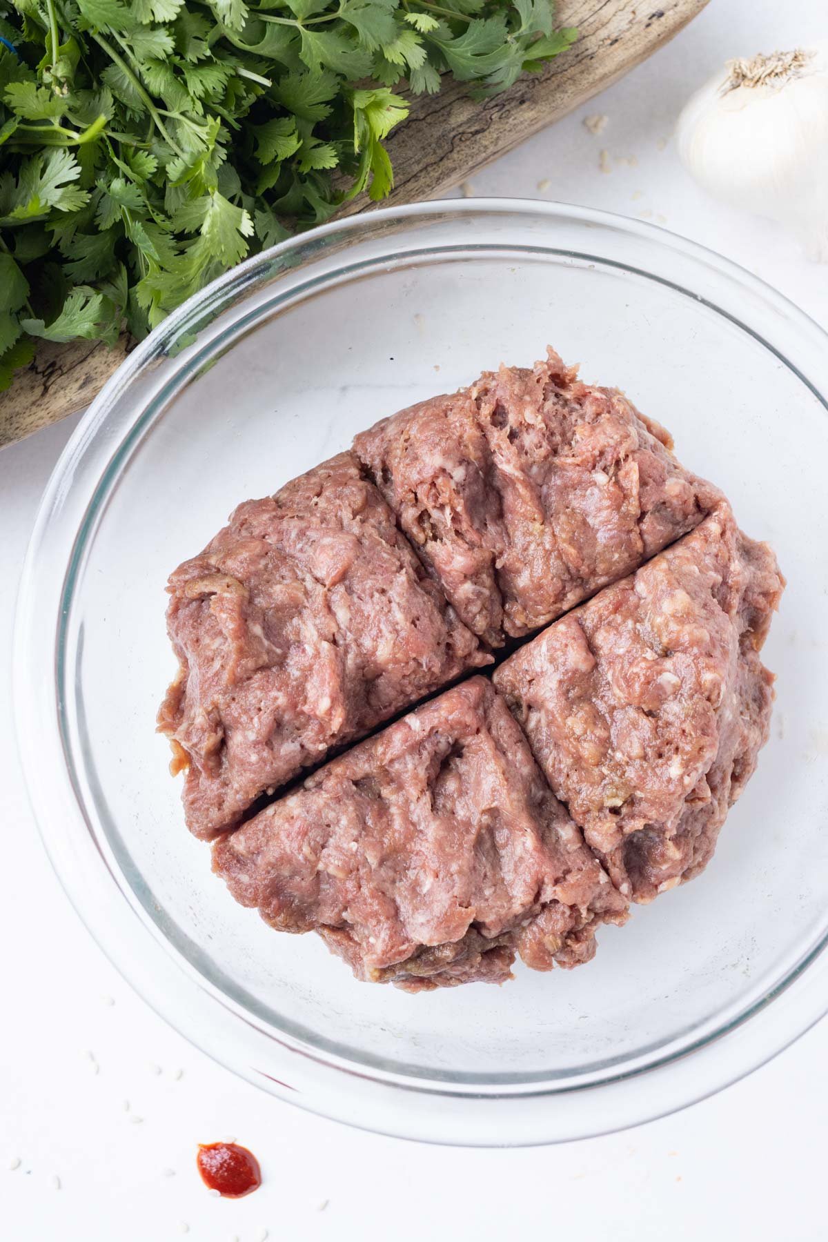Korean seasoned ground beef is divided into four parts.