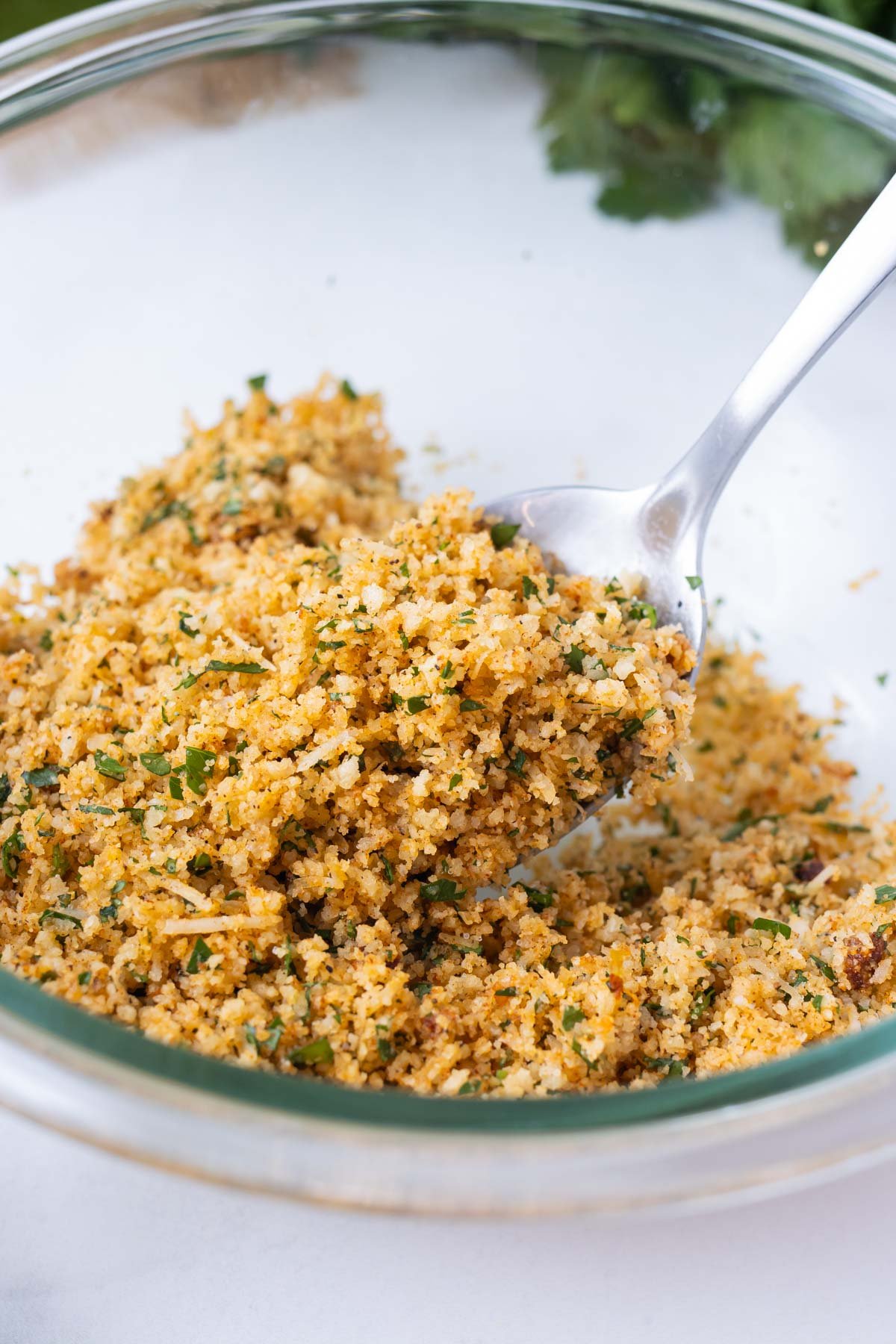 A Panko and Parmesan topping is mixed together.