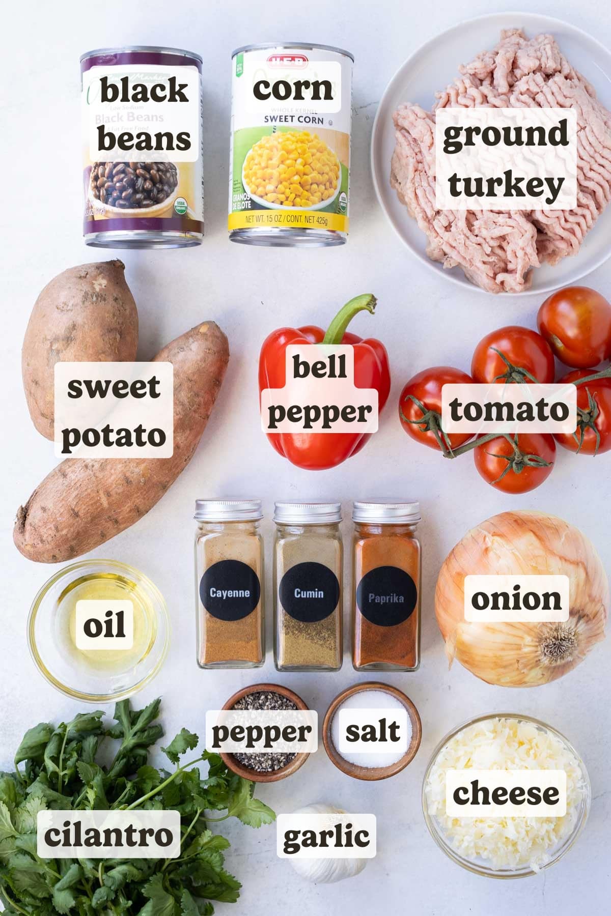 Ground turkey, sweet potato, cheese, onion, tomatoes, bell pepper, and seasonings are the main ingredients for this turkey sweet potato skillet recipe.