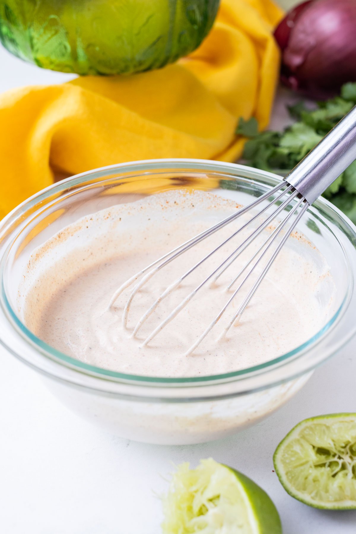 The Mexican Pasta Salad sauce ingredients are whisked together.