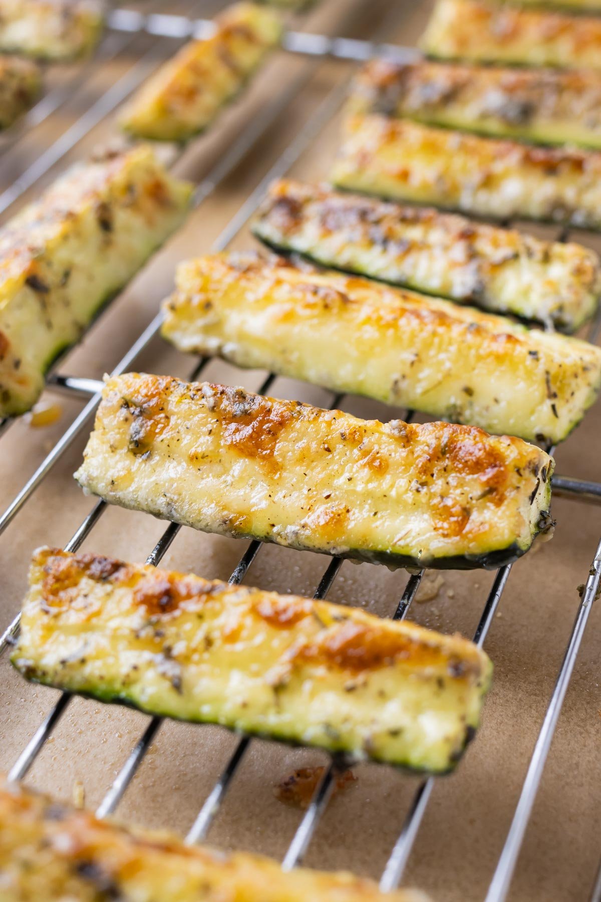 Parmesan crusted zucchini is baked in the oven until golden.