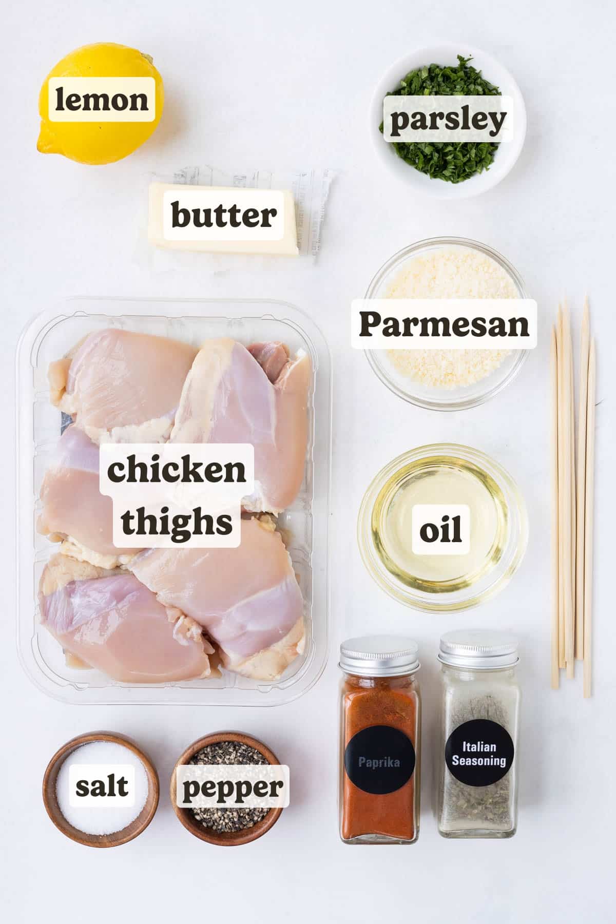 Chicken thighs, Parmesan, butter, parsley, and lemon are the main ingredients for these Parmesan chicken skewers.