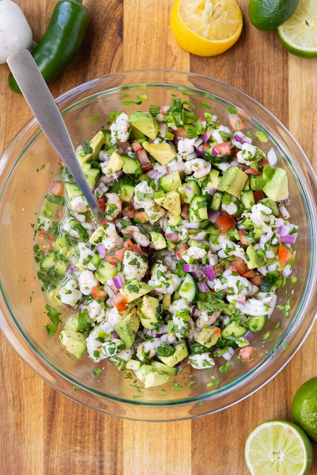 Avocado is mixed into a shrimp ceviche recipe.