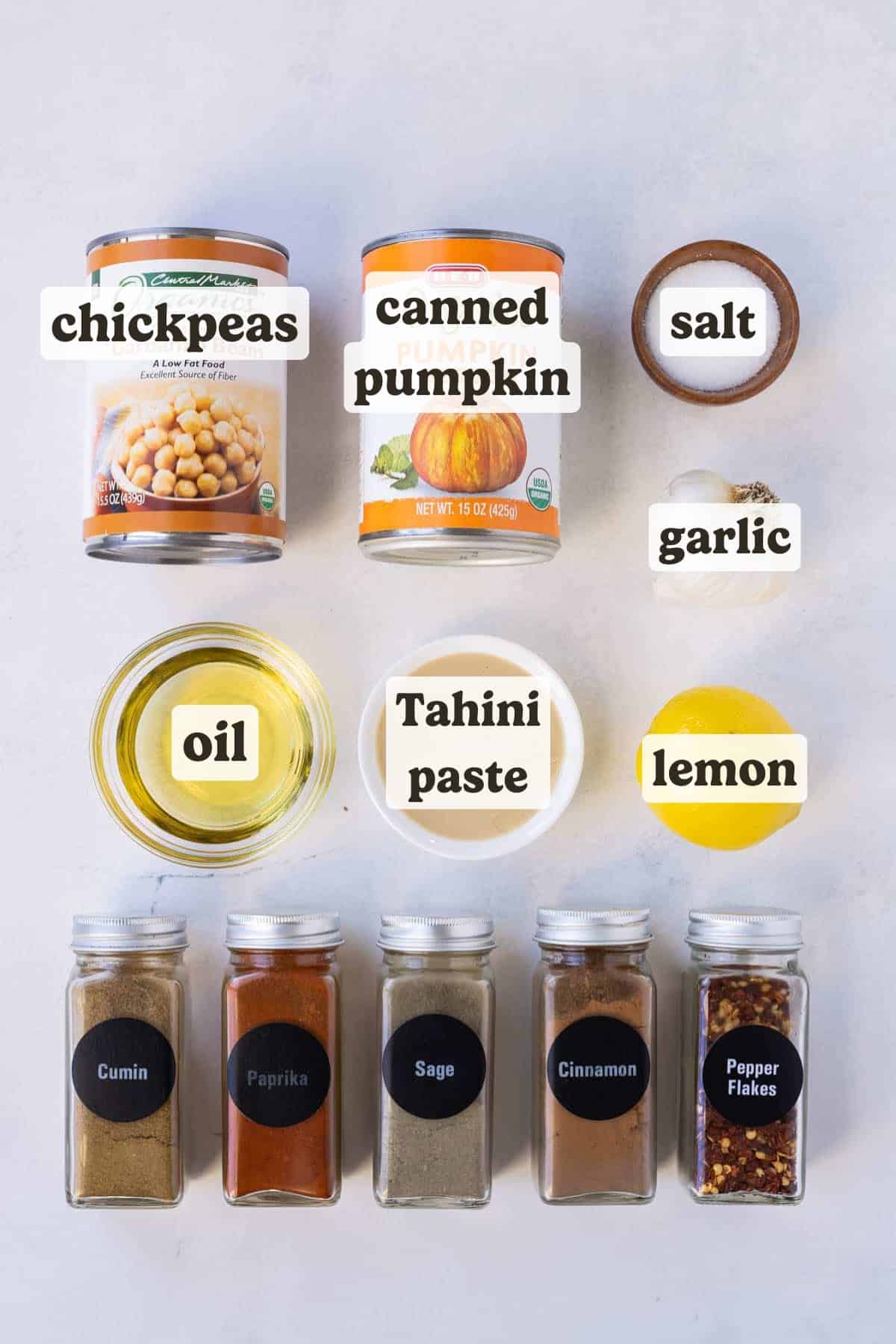 Canned pumpkin, chickpeas, lemon, garlic, Tahini paste, and seasonings are the main ingredients for this pumpkin hummus recipe.