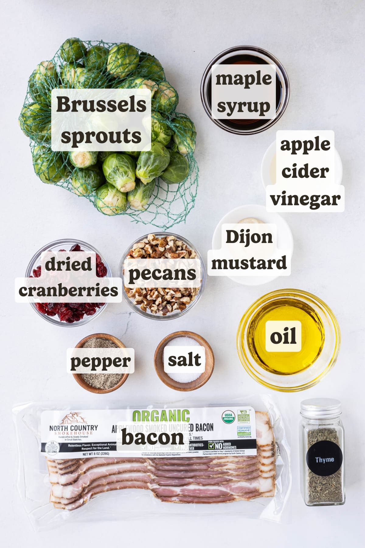 Brussels sprouts, maple syrup, bacon, pecans, dijon mustard, and spices are the main ingredients for this Brussels sprouts dish.