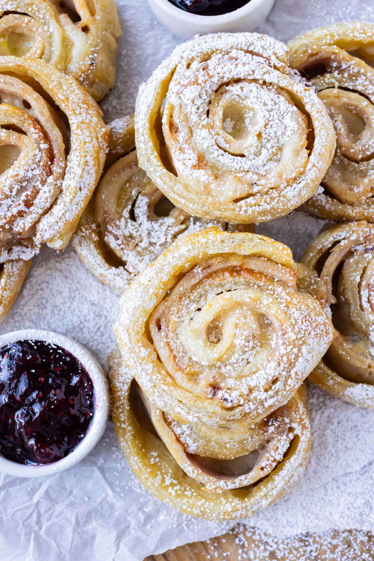 Monte Cristo Puff Pastry Pinwheels are on a serving tray for a holiday appetizer