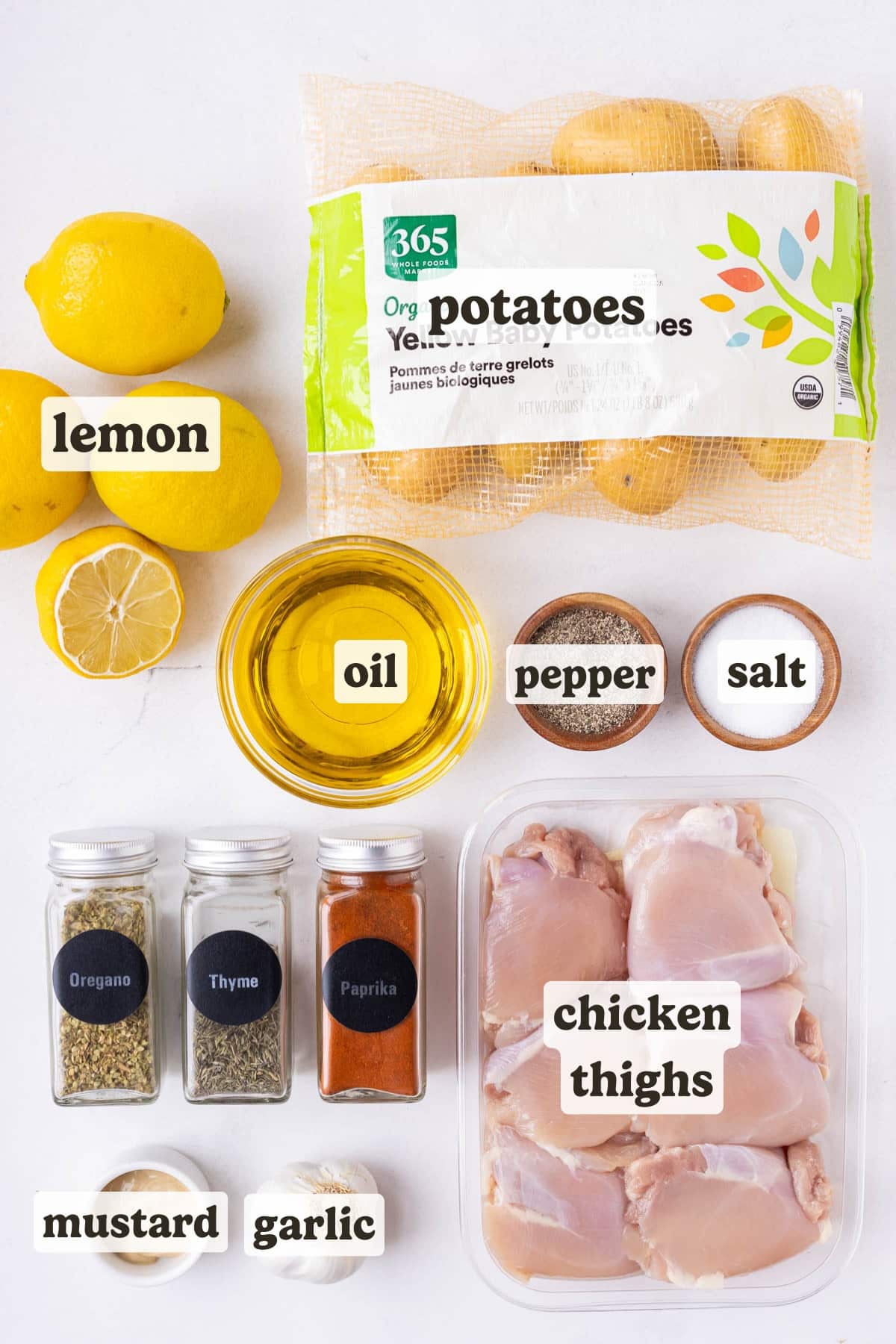 Chicken thighs, potatoes, lemons, mustard, and seasonings are the main ingredients for this Greek Lemon Chicken and Potato dish.