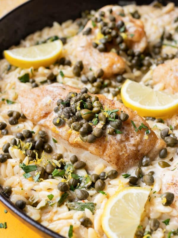 Cod piccata is nestled into creamy orzo in this one-skillet recipe.