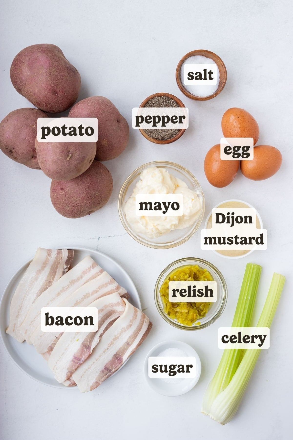 Potatoes, egg, bacon, celery, mayo, and mustard are the main ingredients for this potato salad recipe.