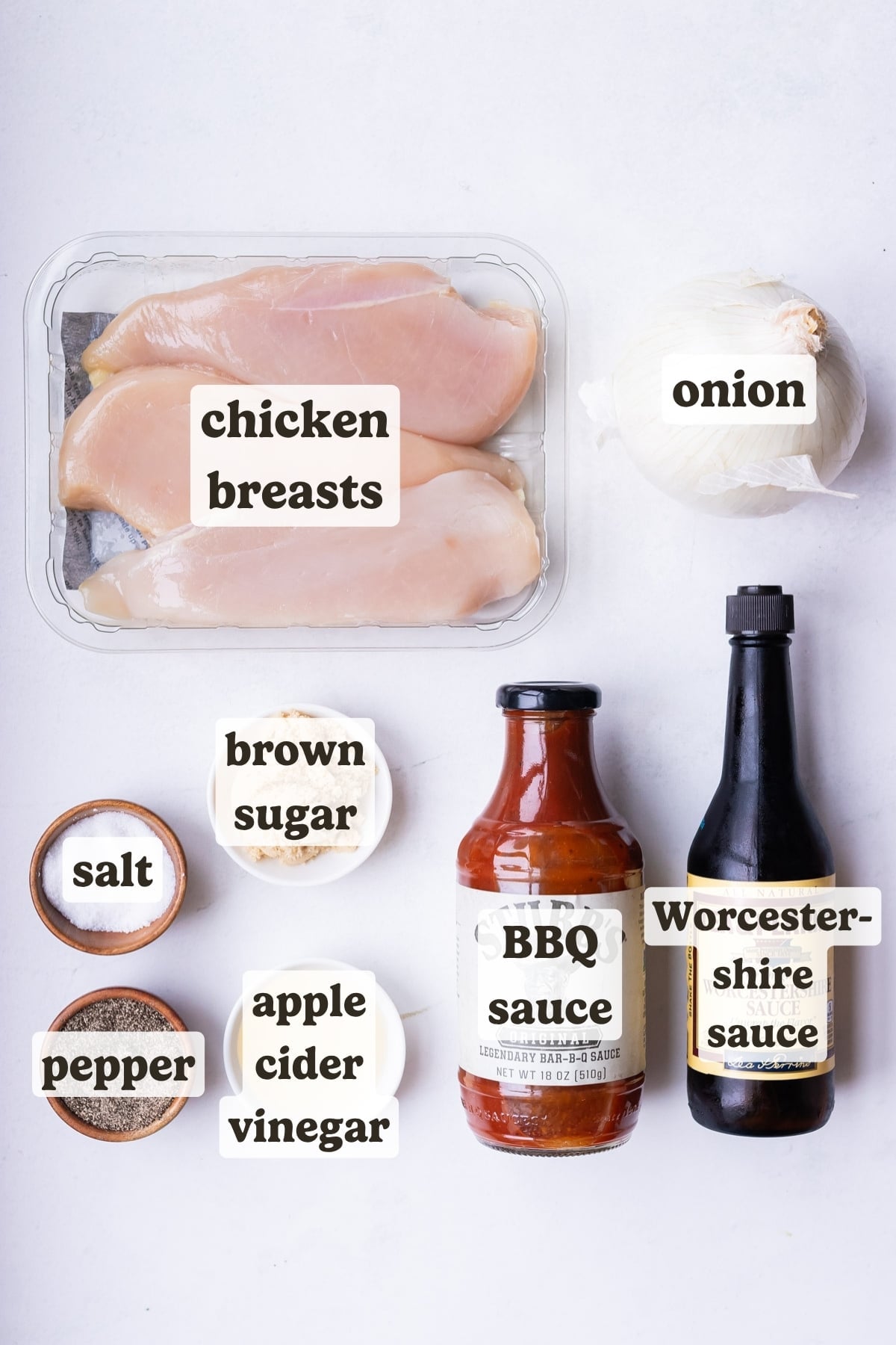 Chicken breasts, onion, BBQ sauce, brown sugar, and seasonings are the main ingredients for this BBQ chicken recipe.