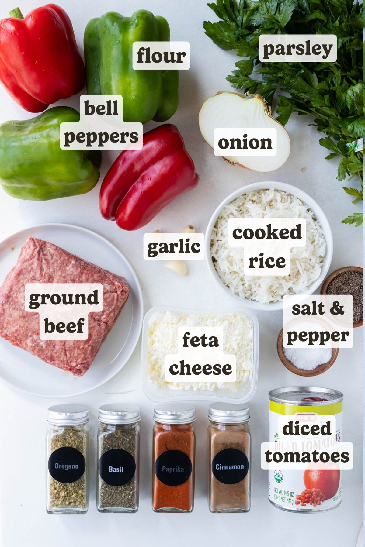Bell peppers, cooked rice, ground beef, spices, diced tomatoes, and parsley are the ingredients for a Greek stuffed peppers recipe.