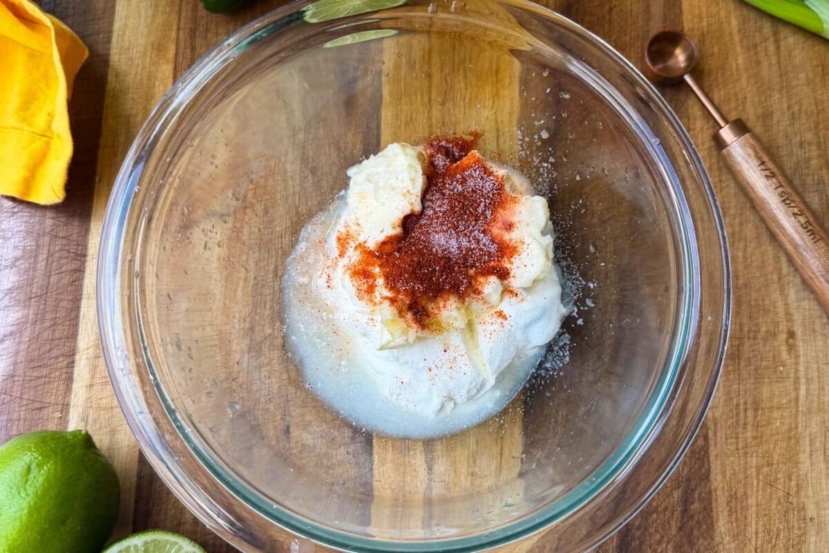 Chili-lime crema is whisked together for a fried corn fritters sauce.