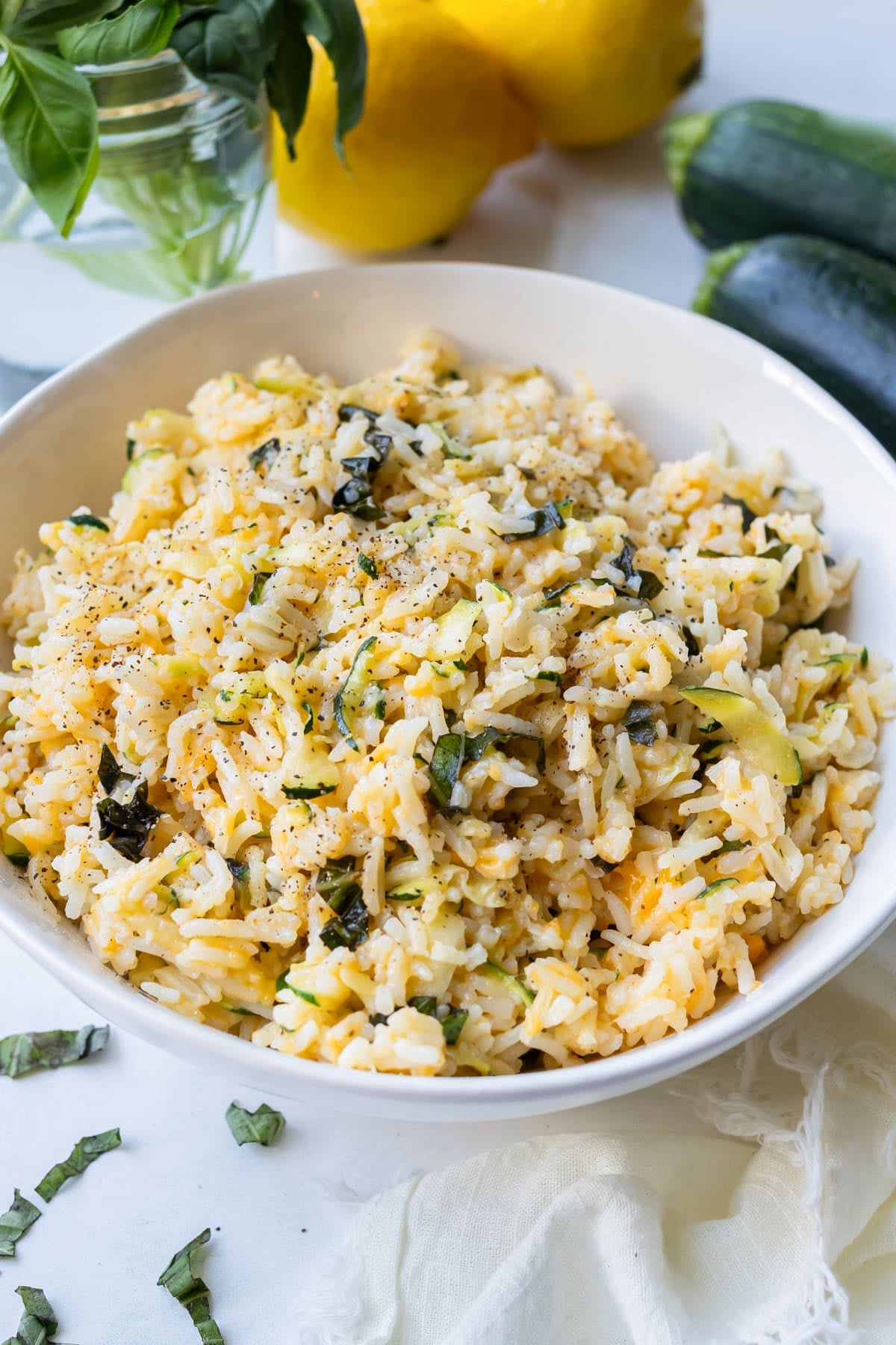 A bowl of cheddar zucchini rice for an easy summer side dish