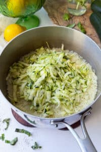 Grated zucchini stirred into cooked rice for zucchini rice