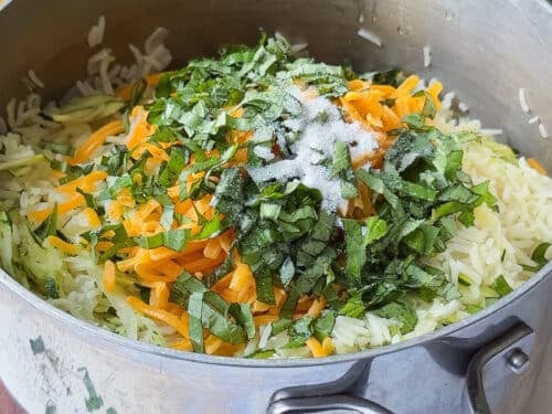 Shredded cheddar and fresh basil added to make cheesy zucchini rice