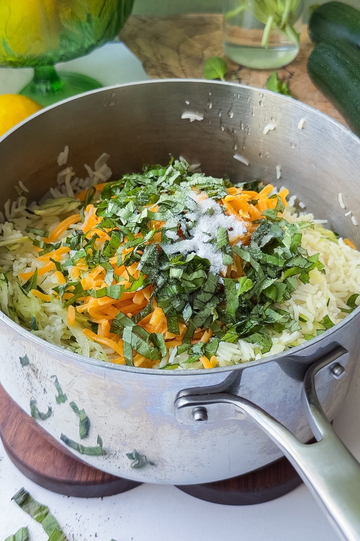 Shredded cheddar and fresh basil added to the zucchini rice