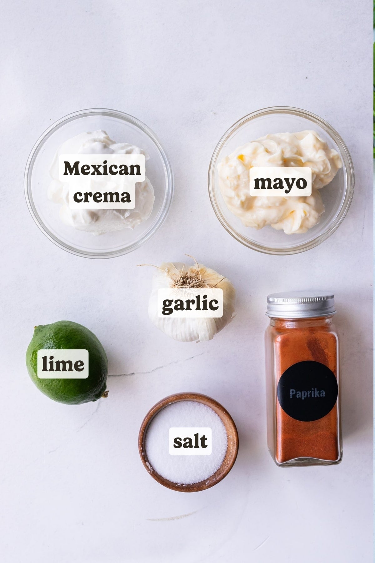 Mexican crema or sour cream, mayonnaise, garlic, lime, and chili powder are the ingredients for a chili-lime crema sauce.