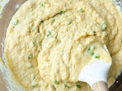 Honey jalapeno cornbread is mixed together in a bowl.