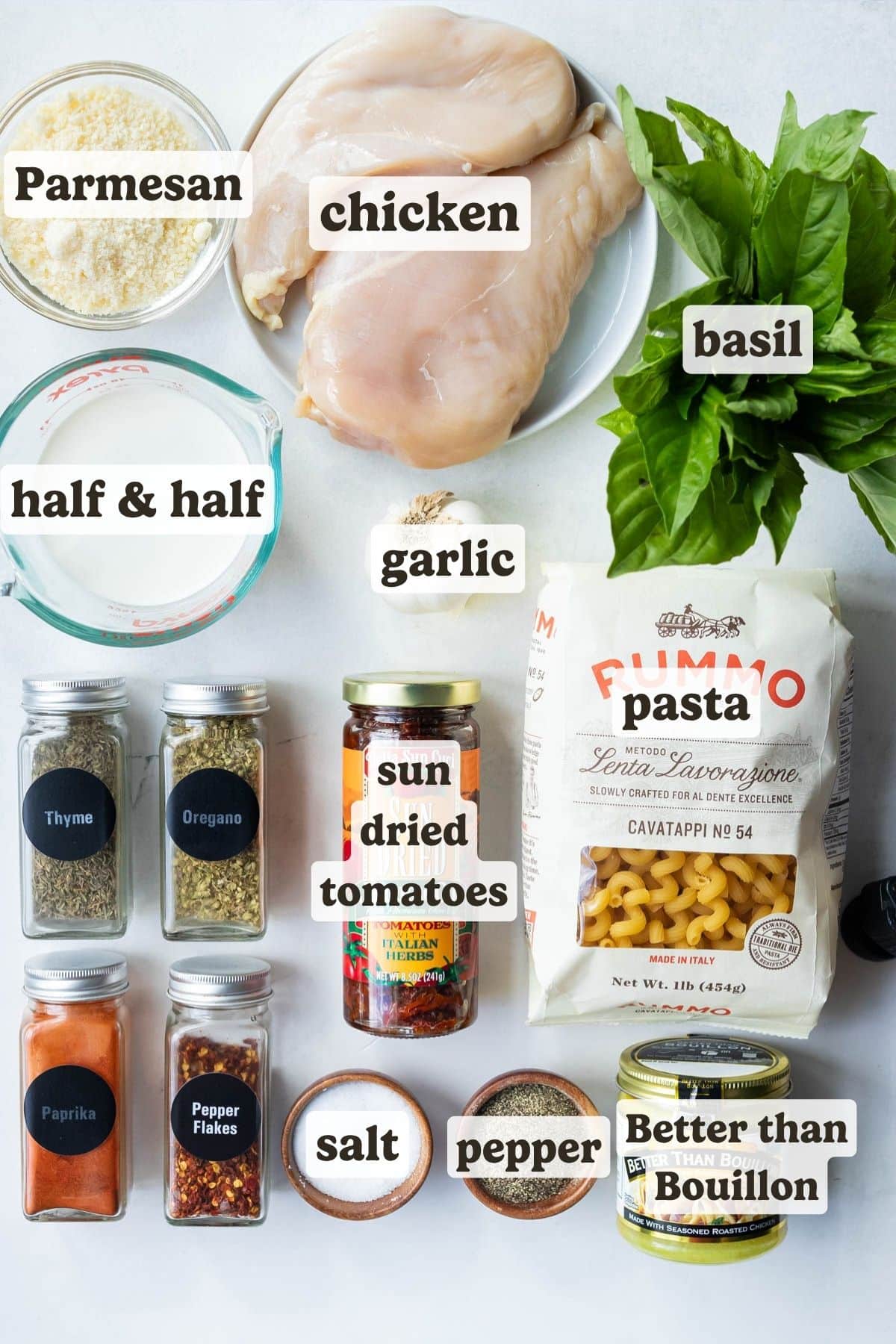 Chicken breasts, basil, pasta, half and half, Parmesan, basil, sundried tomatoes and seasonings are the ingredients for a Marry Me Chicken Pasta Bake.