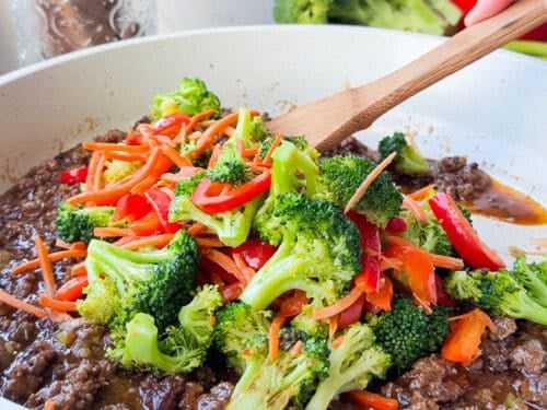 Broccoli, carrots, and peppers stirred into saucy ground beef for an easy ground beef and broccoli dinner