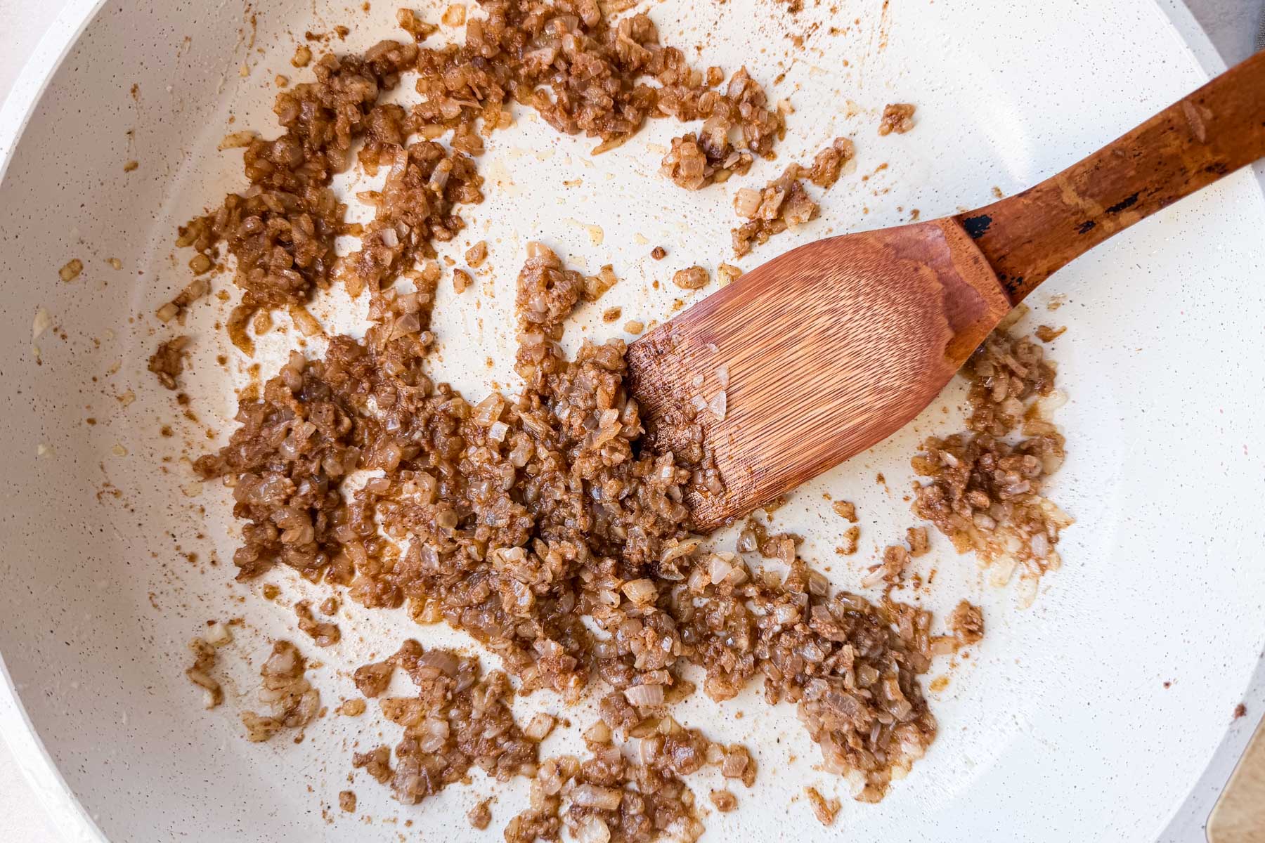 Toasted garam masala, coriander, cumin, and fenugreek stirred into onions for homemade butter chicken sauce