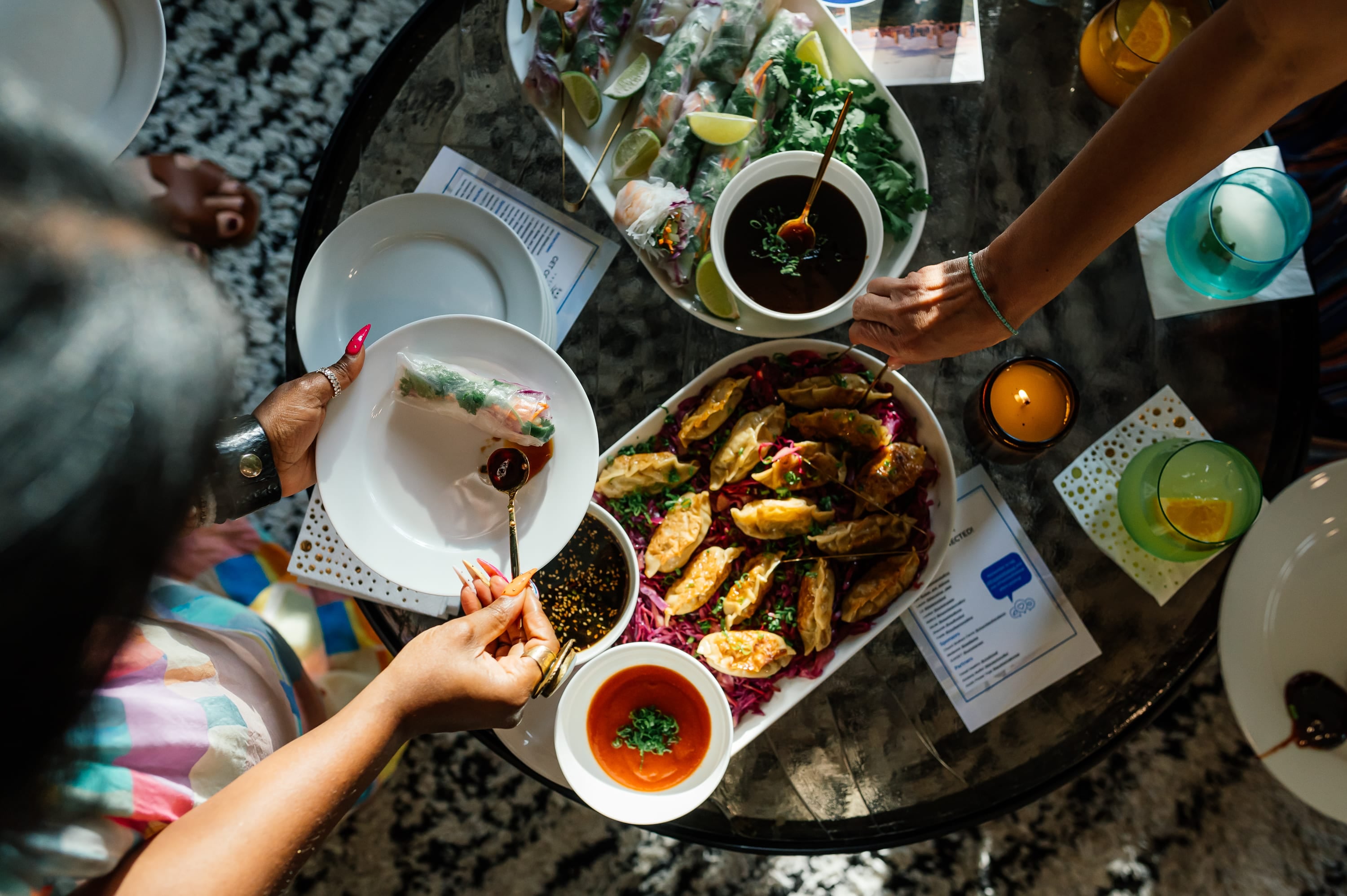 Overhead view of potstickers and an Asian-inspired spread by Chef Trimell at the Fresh Air Retreat