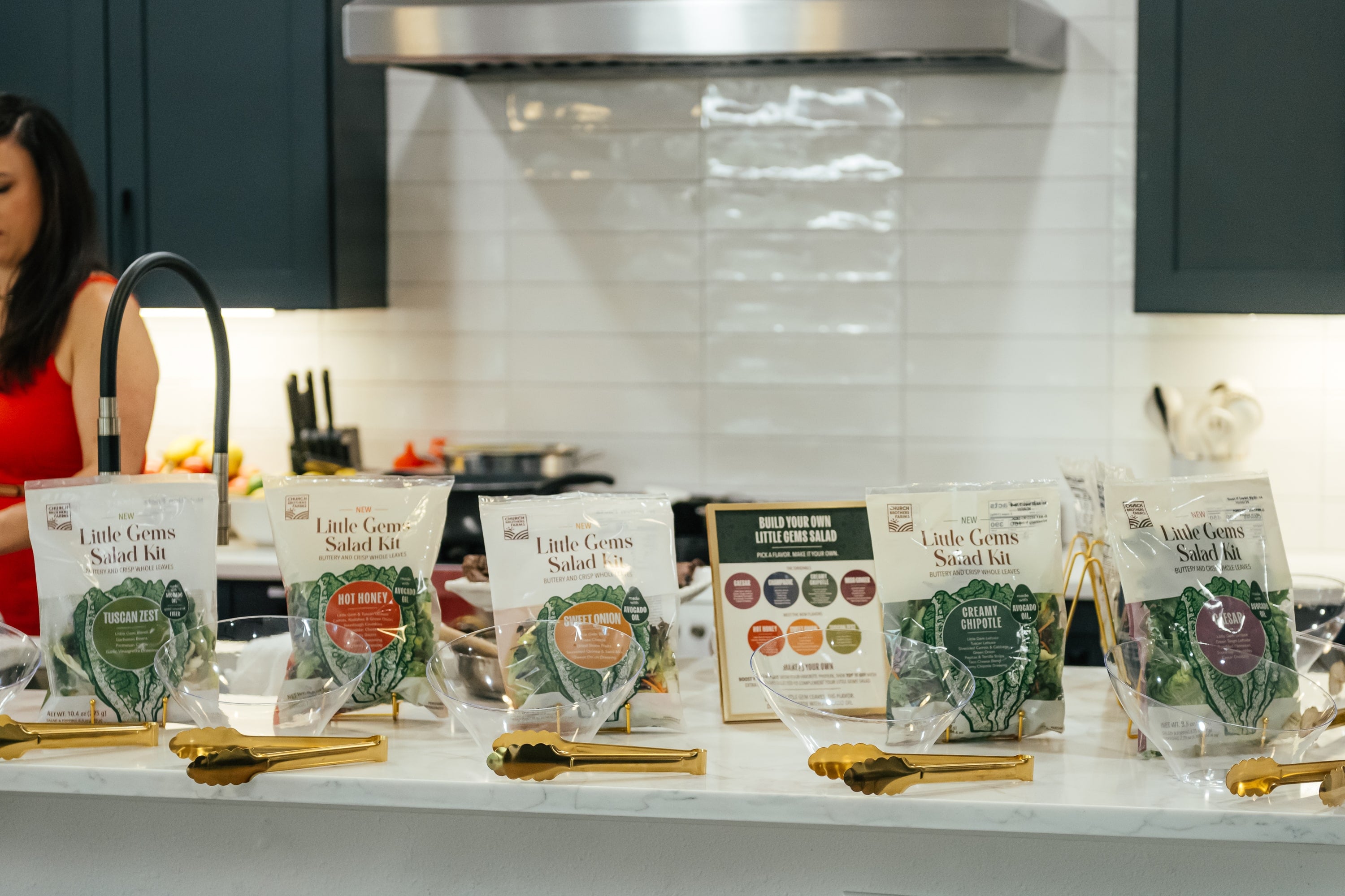 Church Brothers Farms Little Gems Salad Kits lined up on the counter for a salad bar lunch at the Fresh Air Retreat